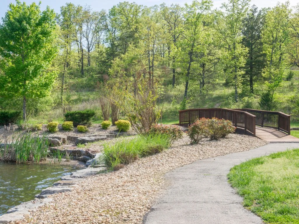 Beautiful walking paths around Fox Hollow Lake, a short walk away..