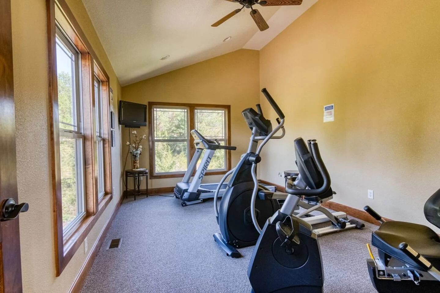 The clubhouse has workout machines available for guests to use.