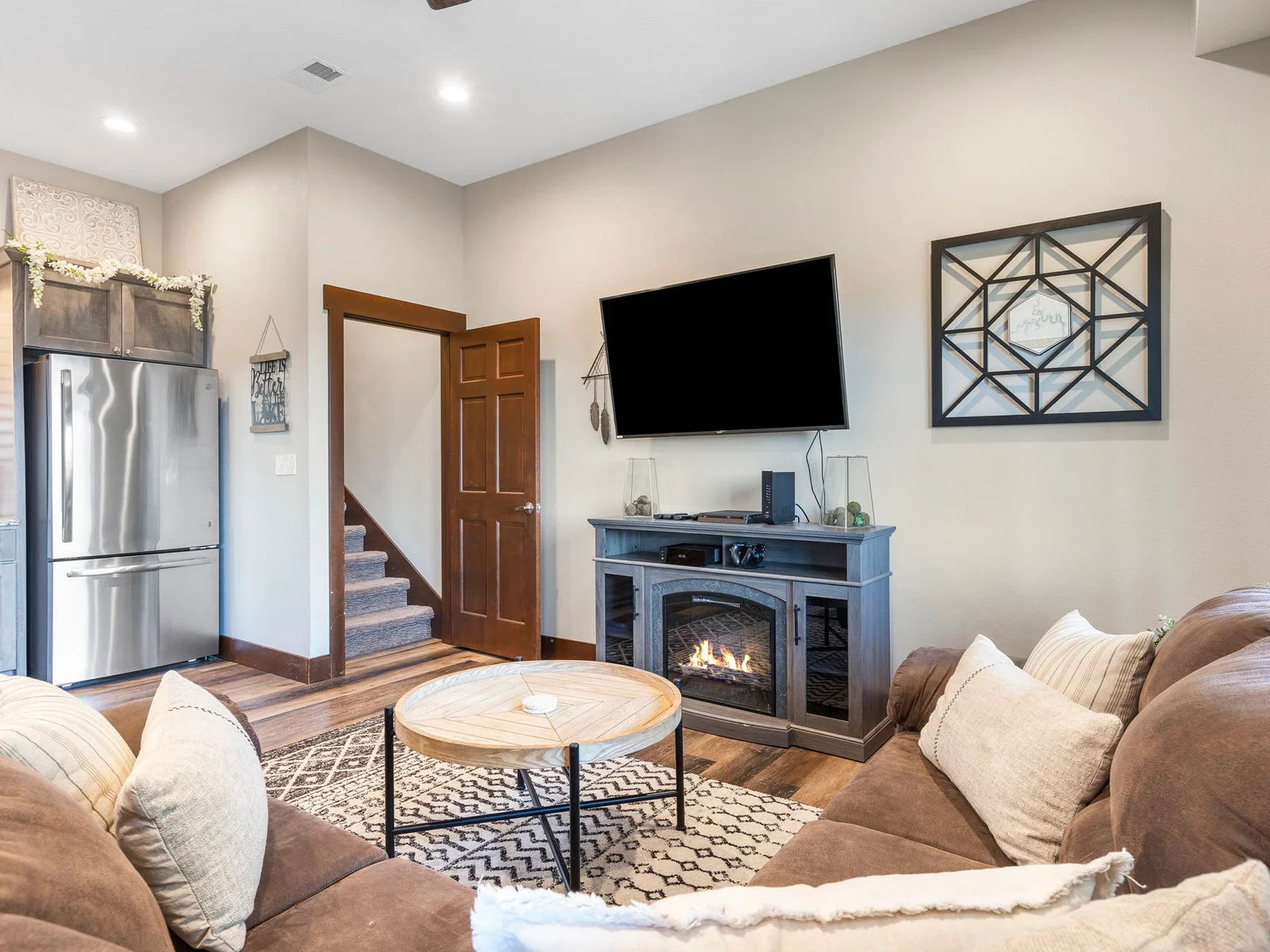 Lower level seating with electric fireplace