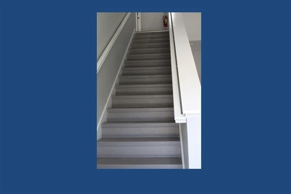 Head up this one flight of stairs and you are home — ground-level entry, condo right at the top. Easy in and out with the whole family and all the gear, no elevator waiting required.