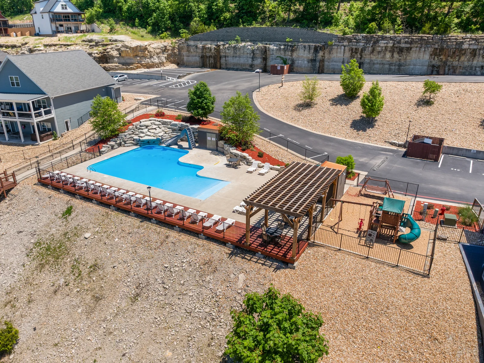 Outdoor pool and playground. Literally right next to our lodge! Beach entry and lots of lounging space. Open from May through September (ask about exact dates.)