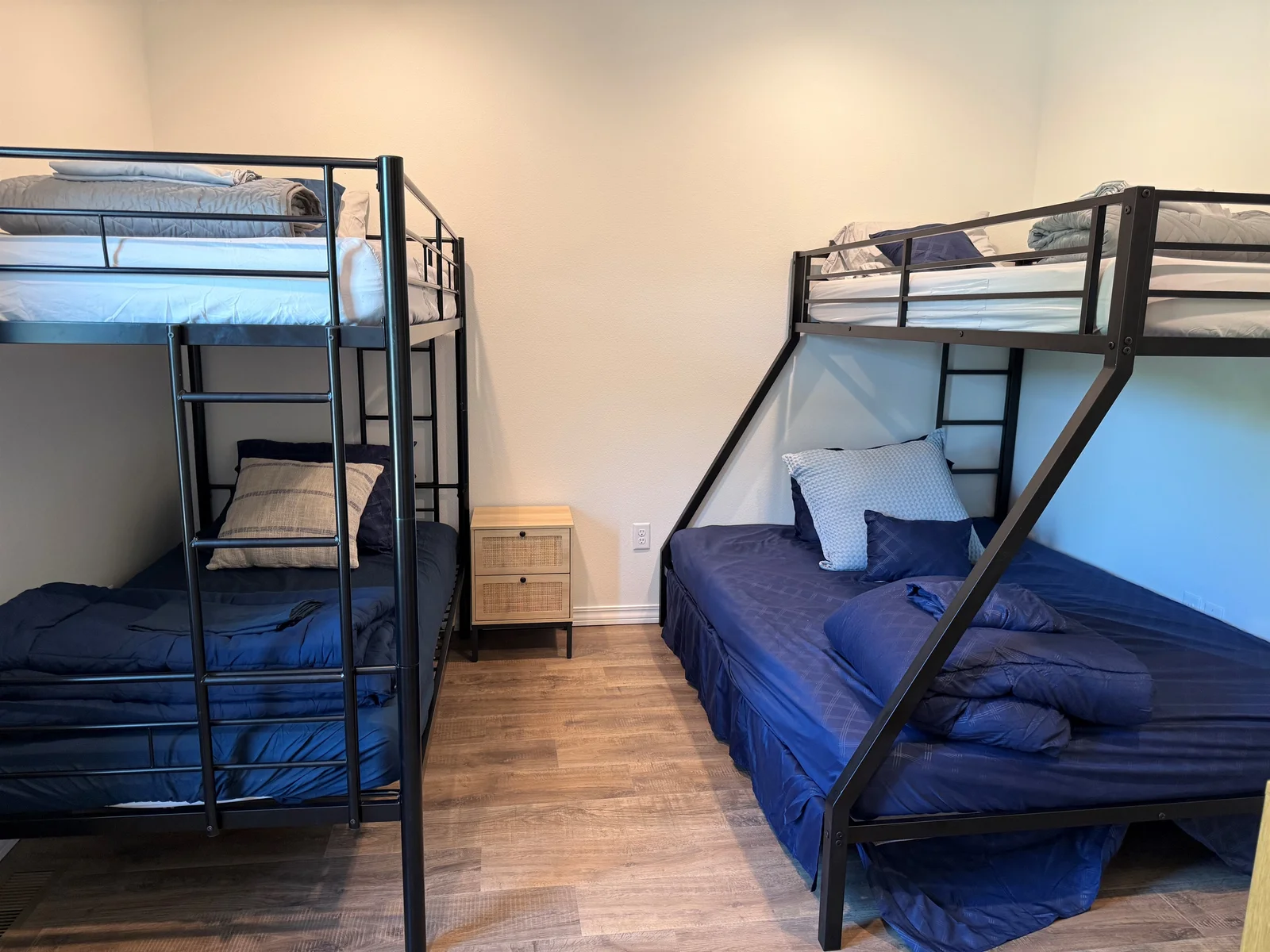 Bedroom is large enough to provide space between both bunk beds.