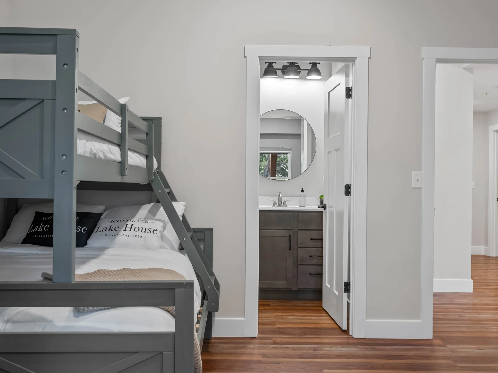 Bunk room. Laundry room is located in the hall just off this room.