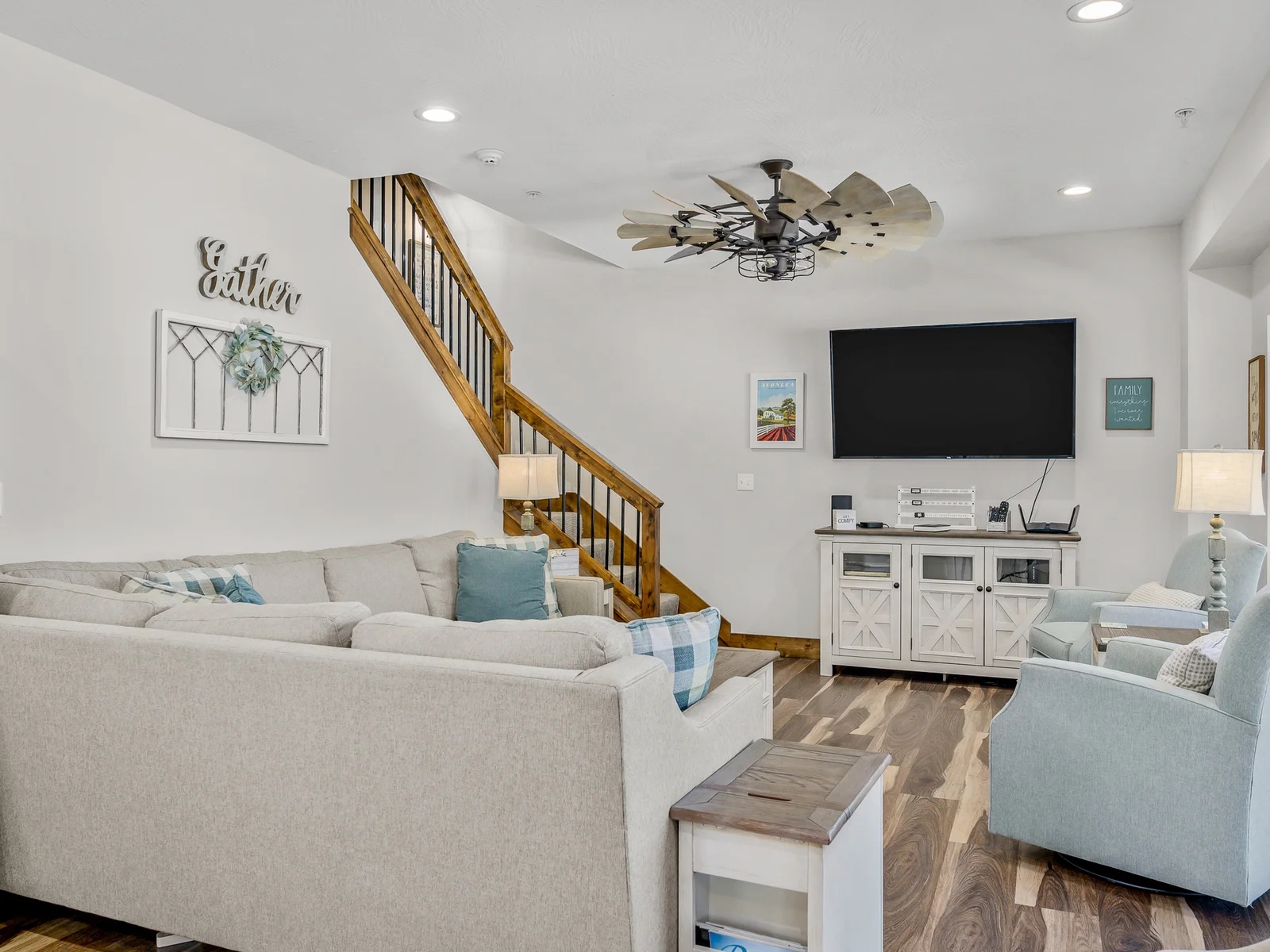 Main living area with 65" smart TV and DVD player