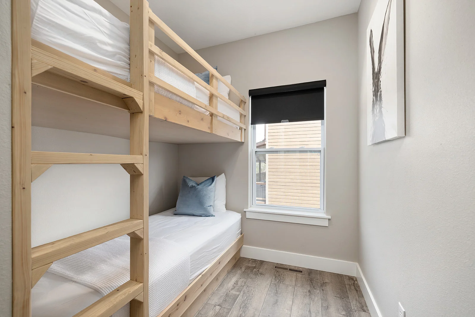 Main level bunk room with 4 twin beds