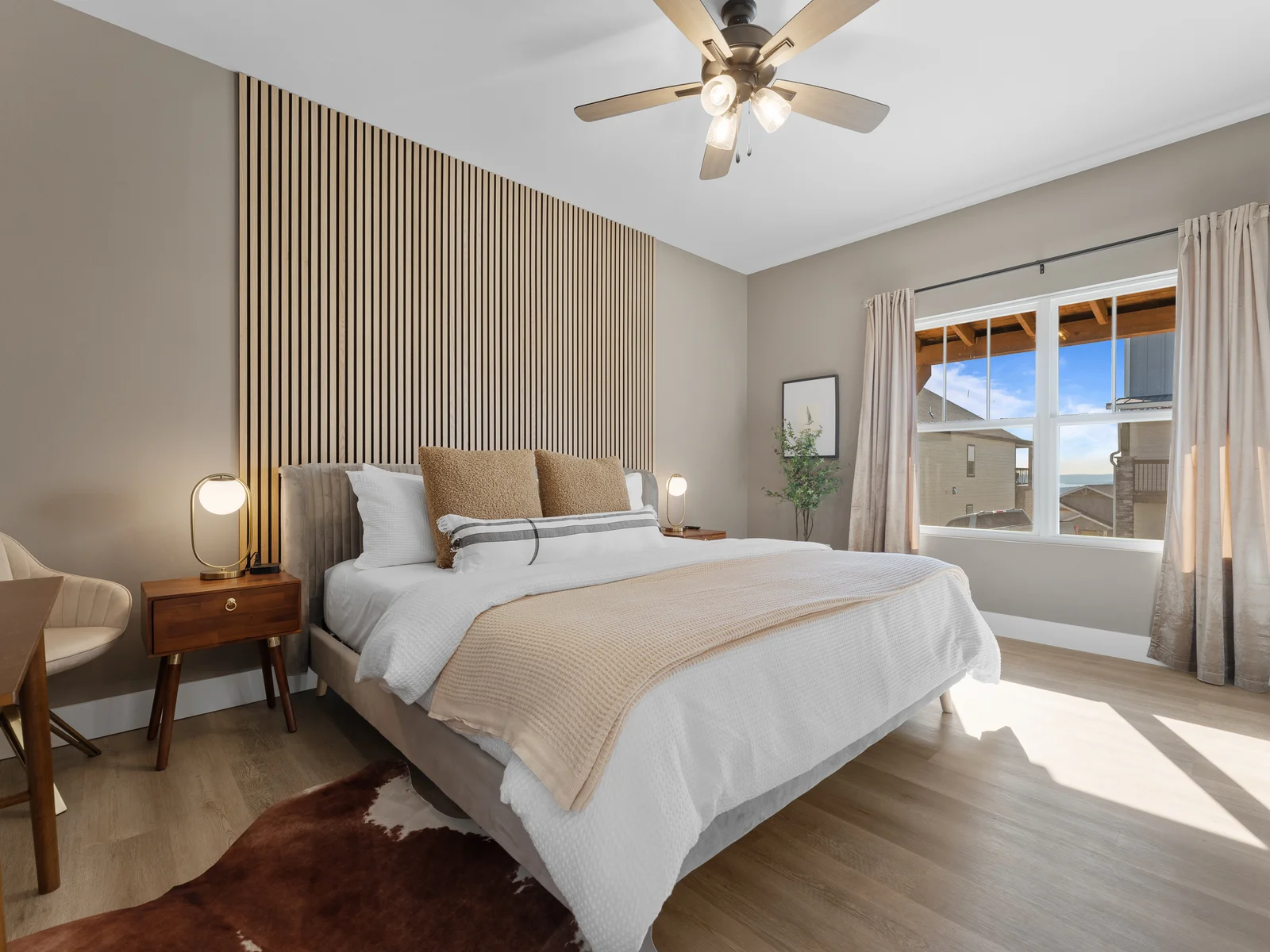 Sleek design with a king bed, natural light, and stylish decor awaits your stay!