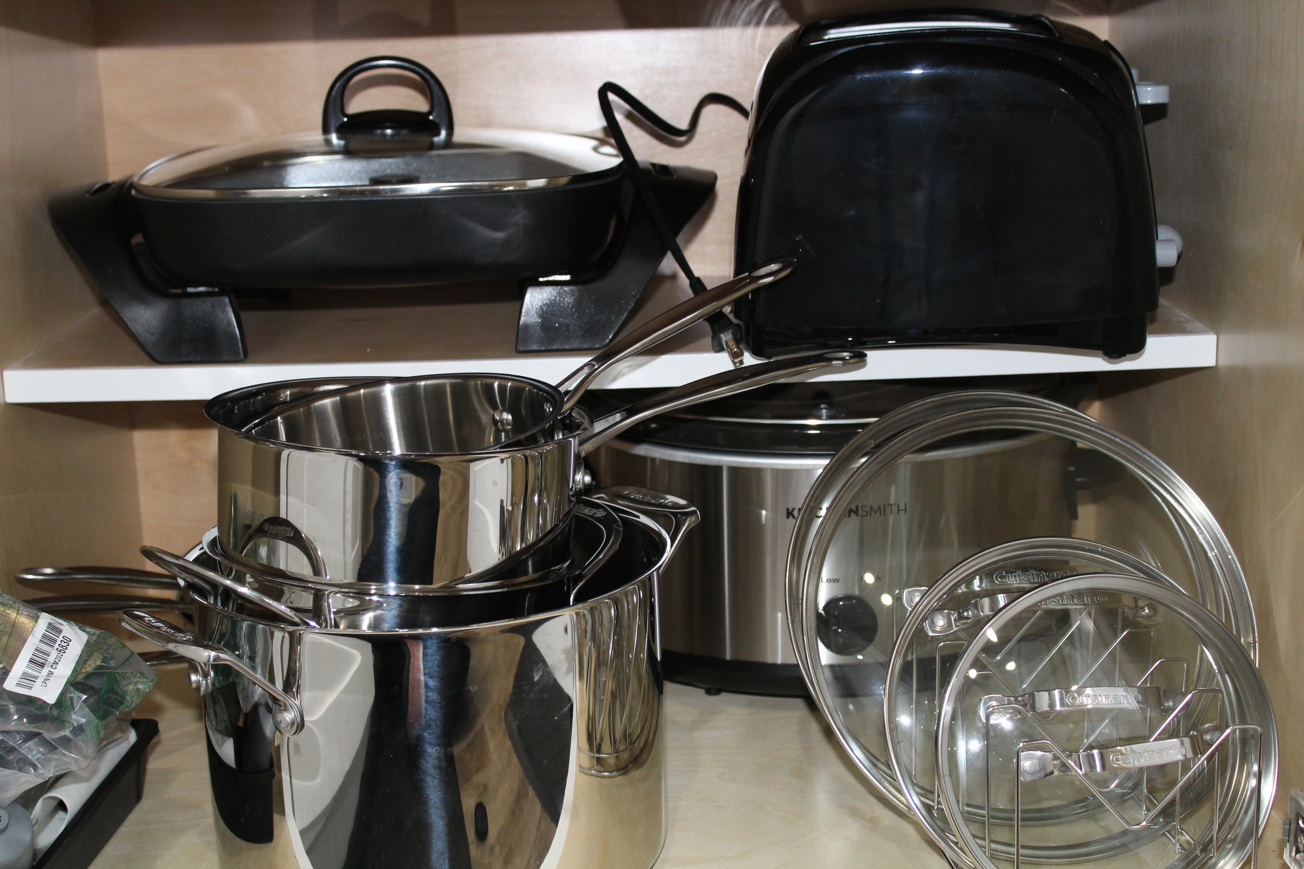 Fully stocked kitchen for the most ambitious chef with quality pots, pans, a slow cooker, electric skillet, and more.