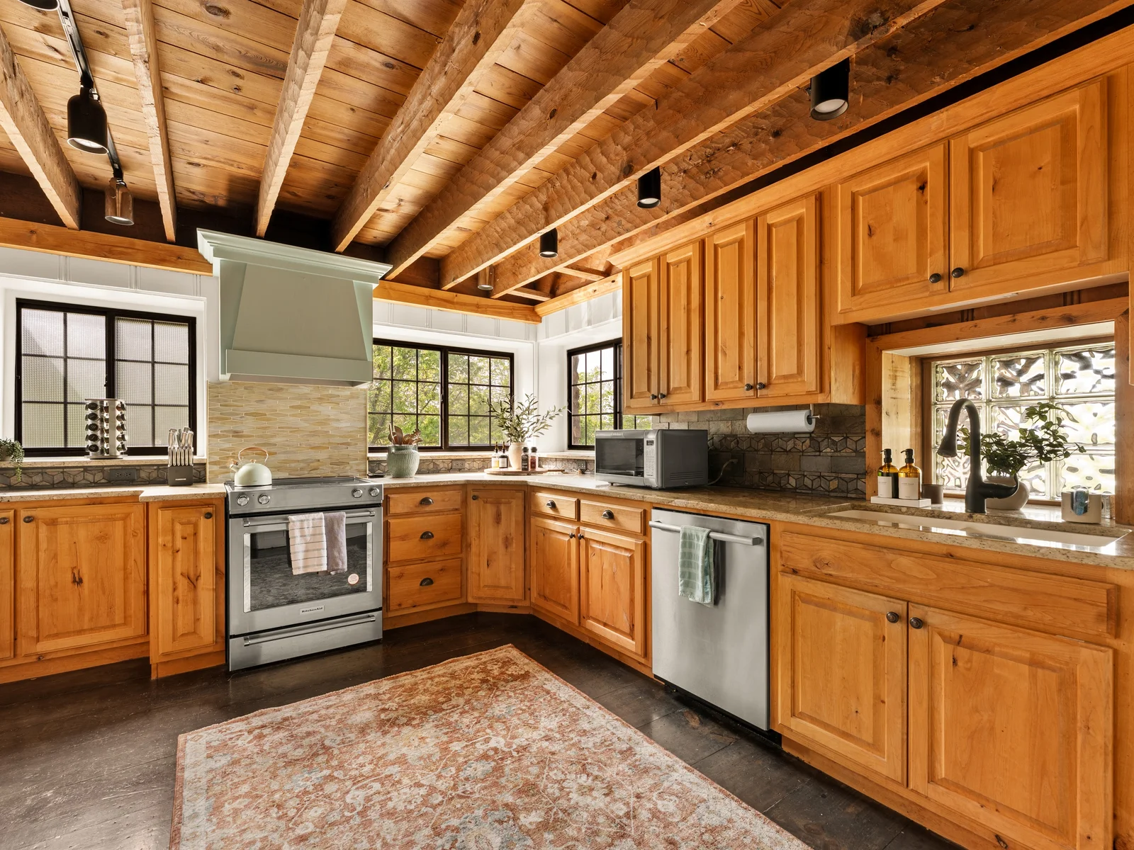 A warm, fully equipped kitchen ready for gathering and cooking.