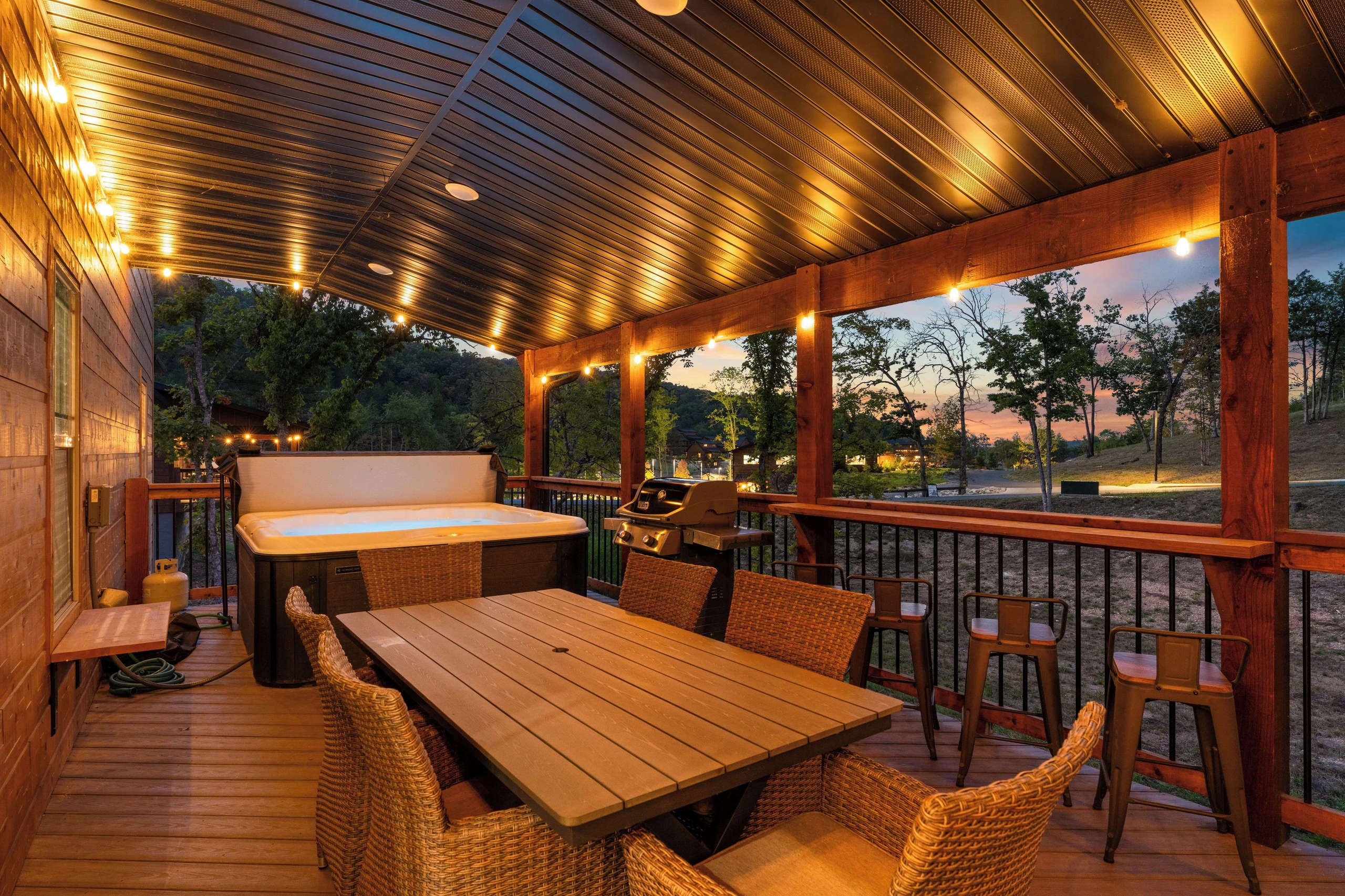 Outdoor amenities lighting visible from the deck.