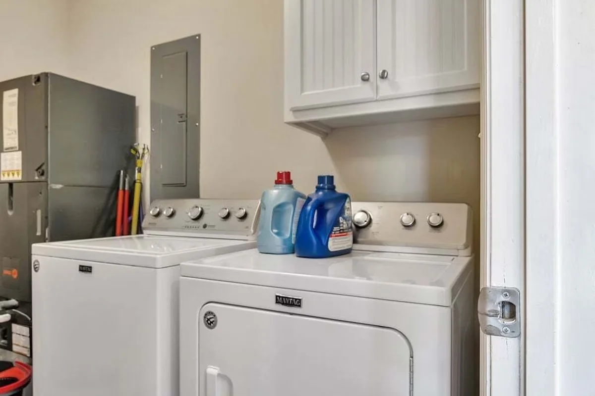The washer and dryer are in the house and free to use.