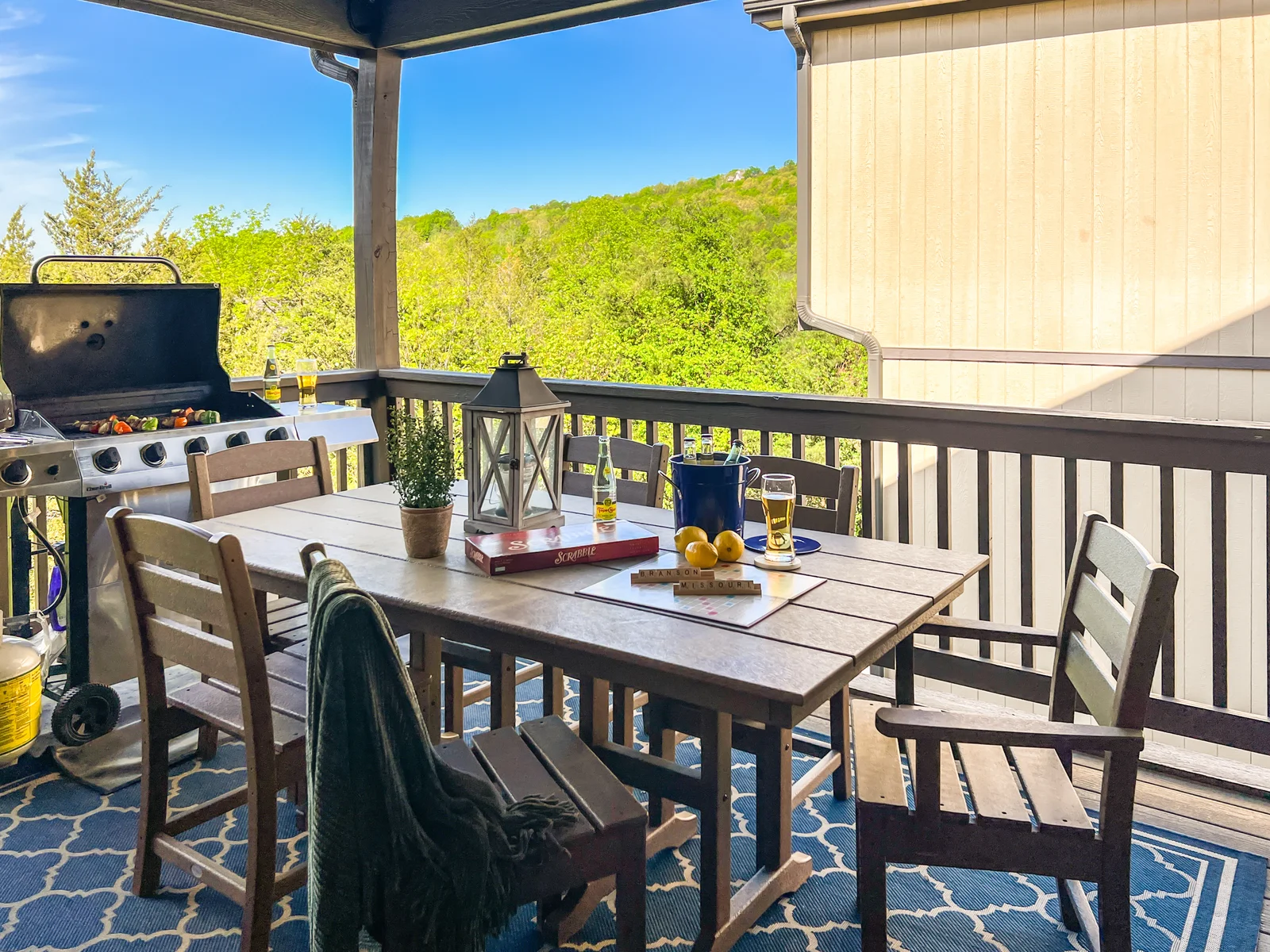 Enjoy a meal and some games on the patio while grilling dinner.