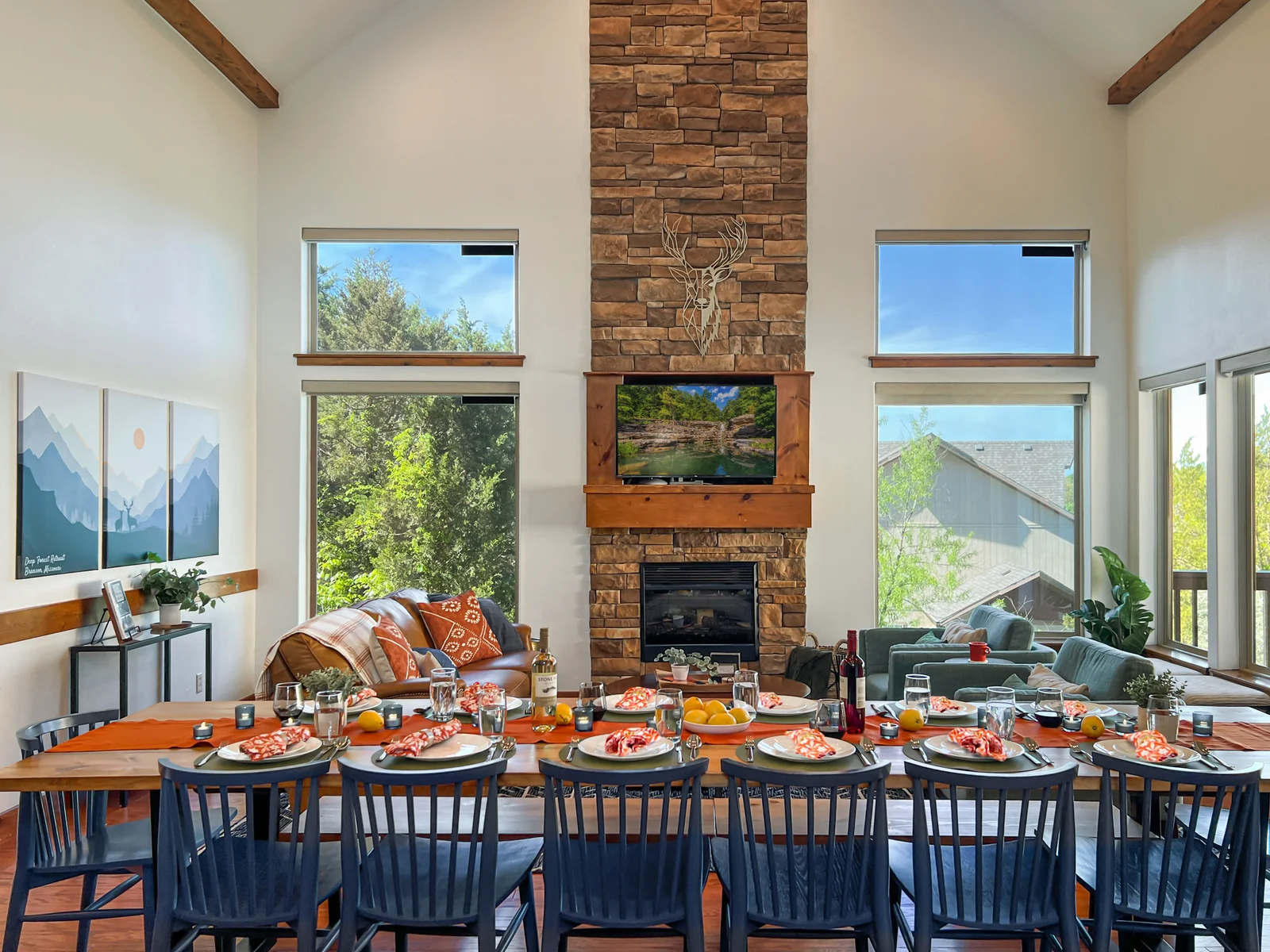 The main level living room is so spacious, and can somehow seat everyone at the table.