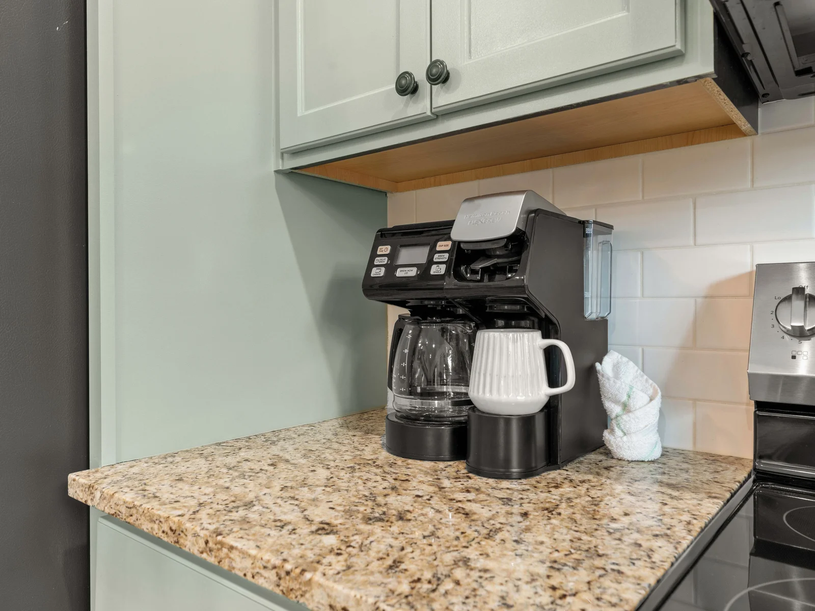 Coffee maker with drip option or pod option.