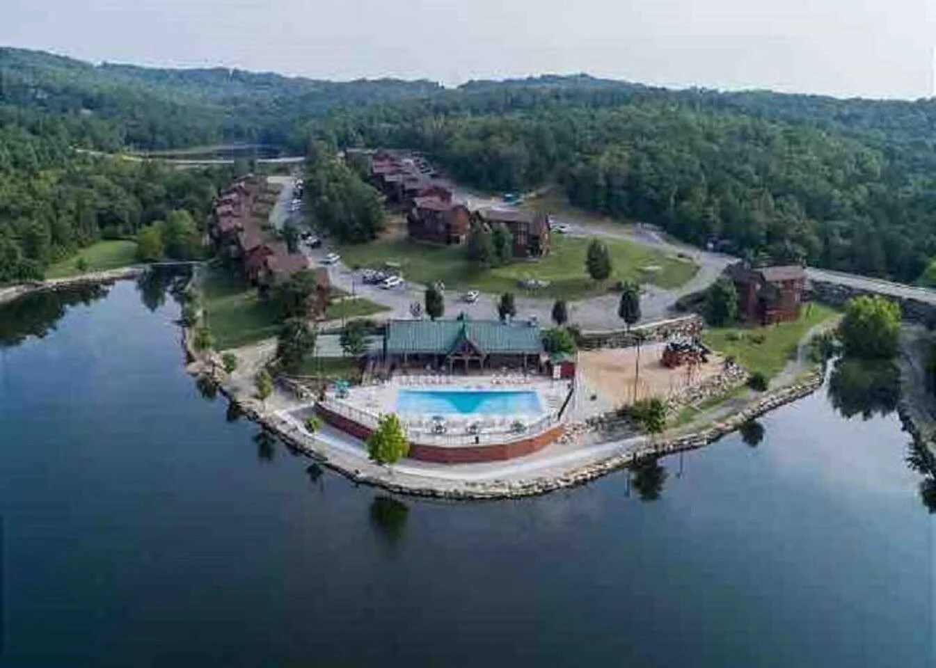 Aerial view of the main pool and catch and release lake - walking distance from the cabin!
