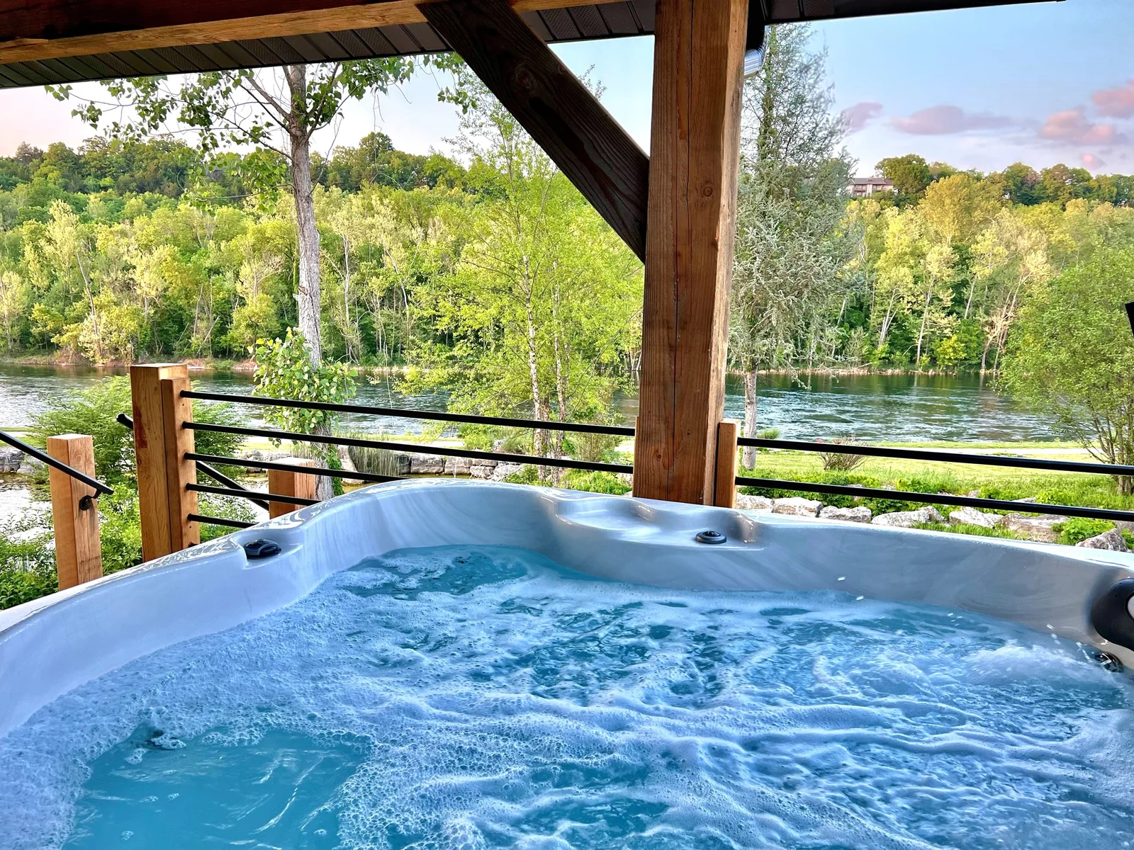 Relax for a while in the hot tub overlooking the lake!