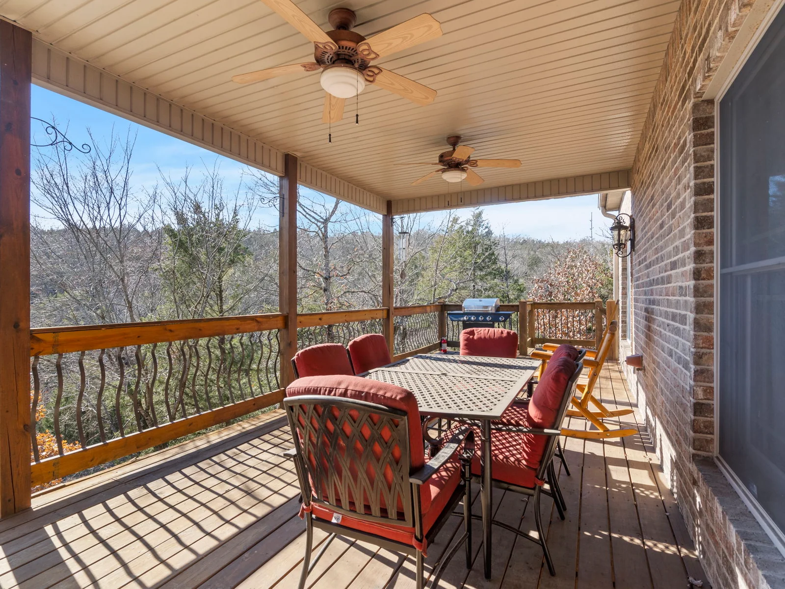 Main level deck with grill and outdoor seating