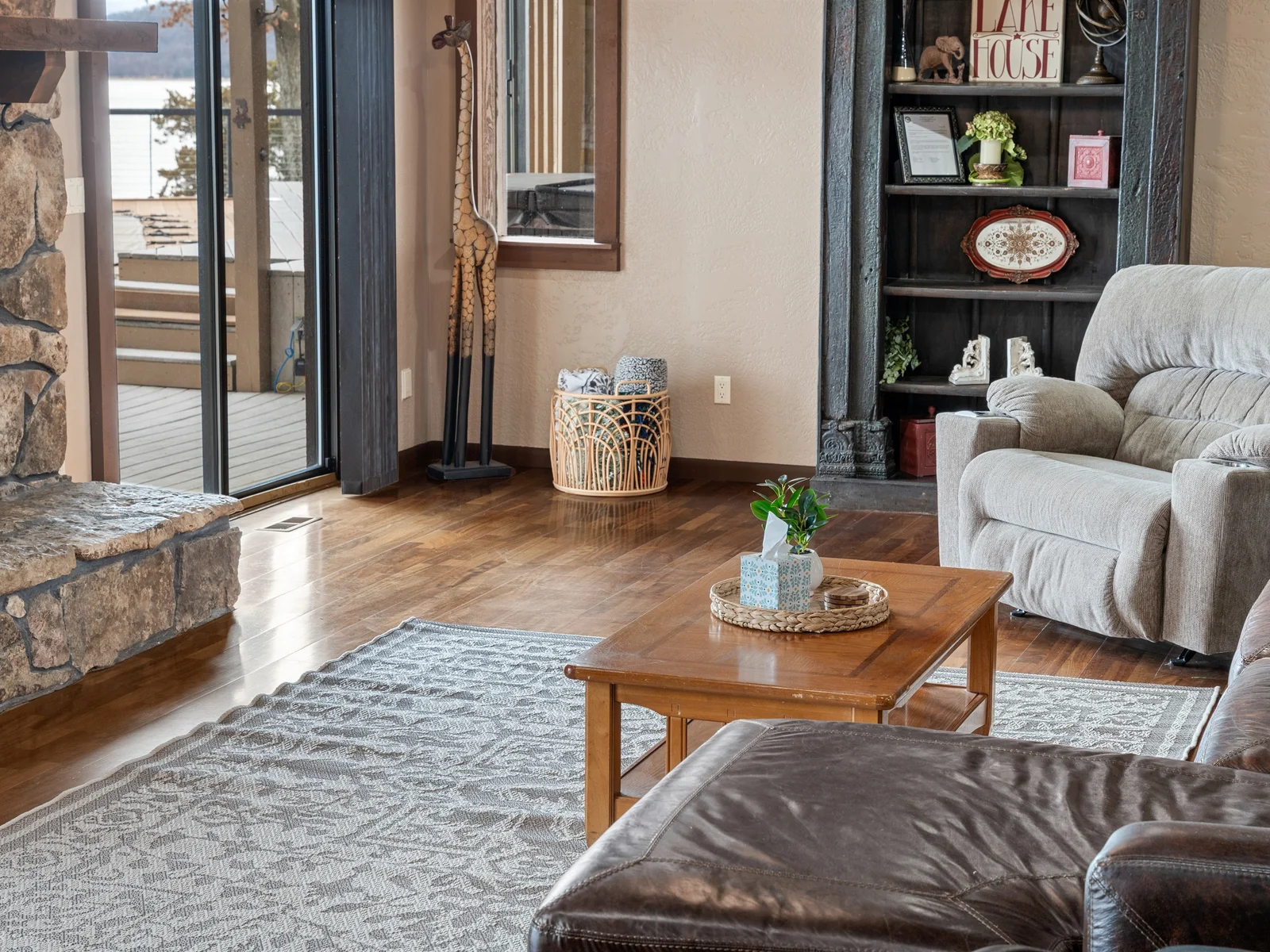 Thoughtfully designed interiors blend rustic charm with comfort for an elevated lake getaway.