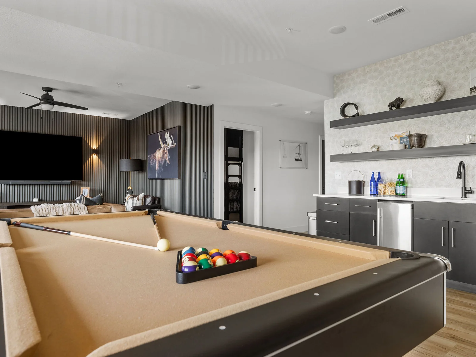 Challenge your family to a game of pool or games on the PS5!