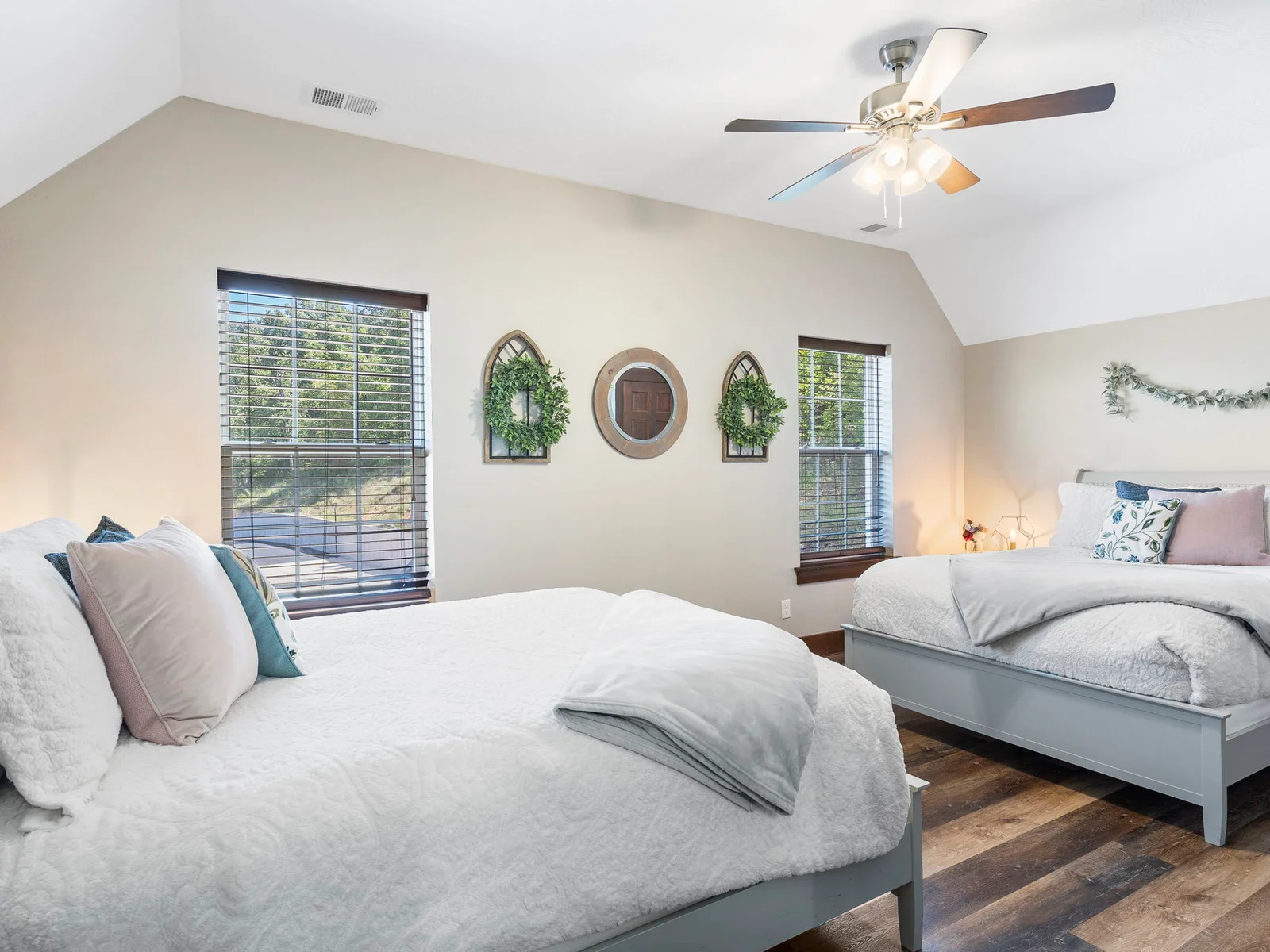 Two queen beds in upper level bedroom with Ensuite bathroom