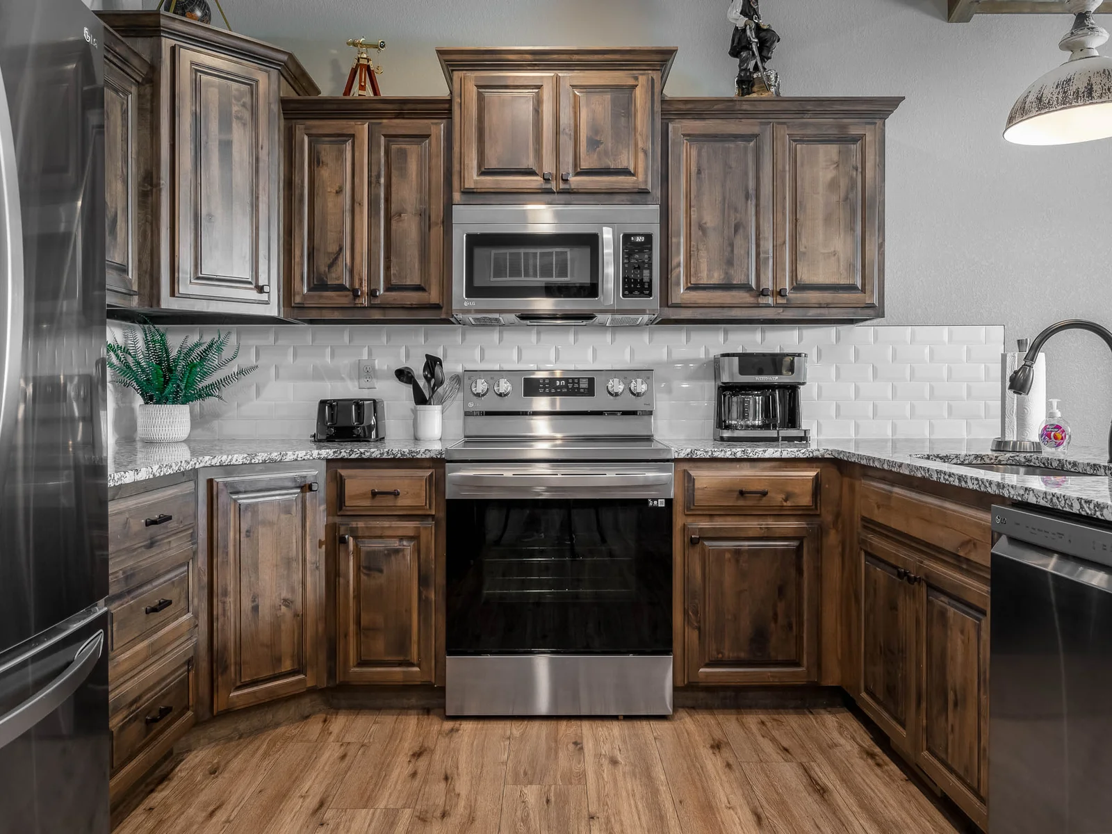 Kitchen with full sized stainless appliances