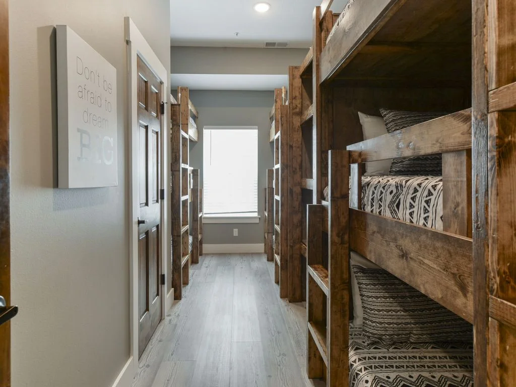Each bunk has an outlet to charge phones/tablets!