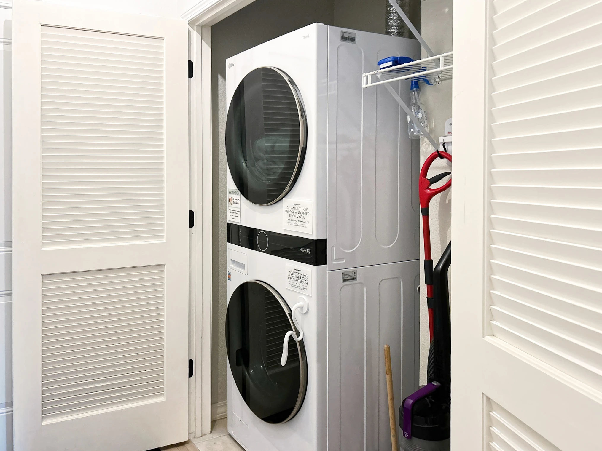 In the hallway you'll find the washer and dryer.