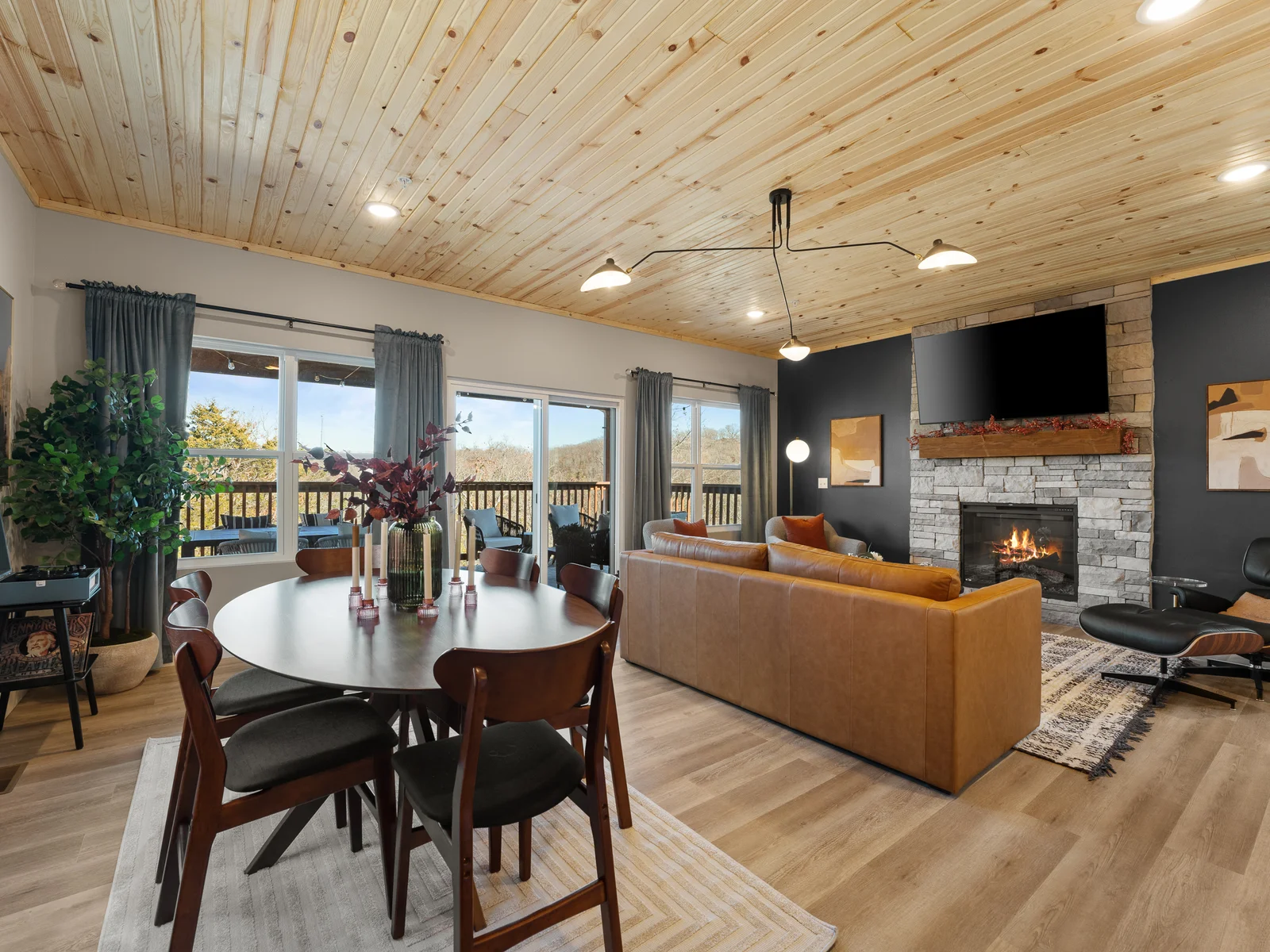 Living Room: Gather around the fire and enjoy stunning views from the oversized windows!
