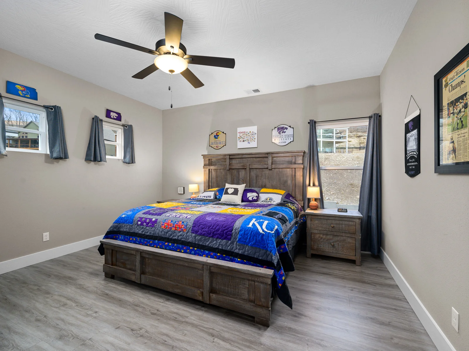 Upper level: Upper level: Kansas room with king bed. Bathroom located in hall.