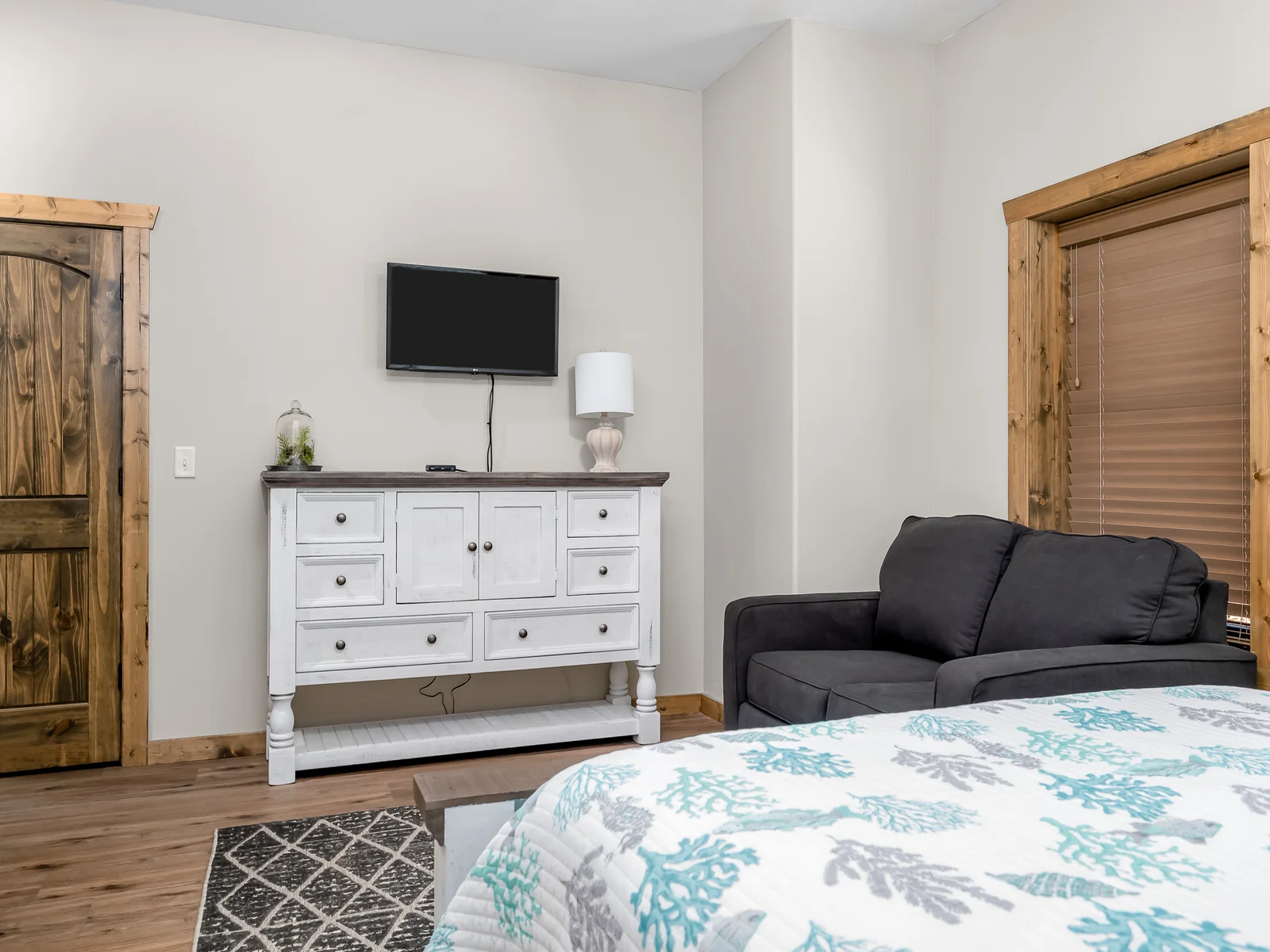 Lower level queen bedroom with sleeper sofa