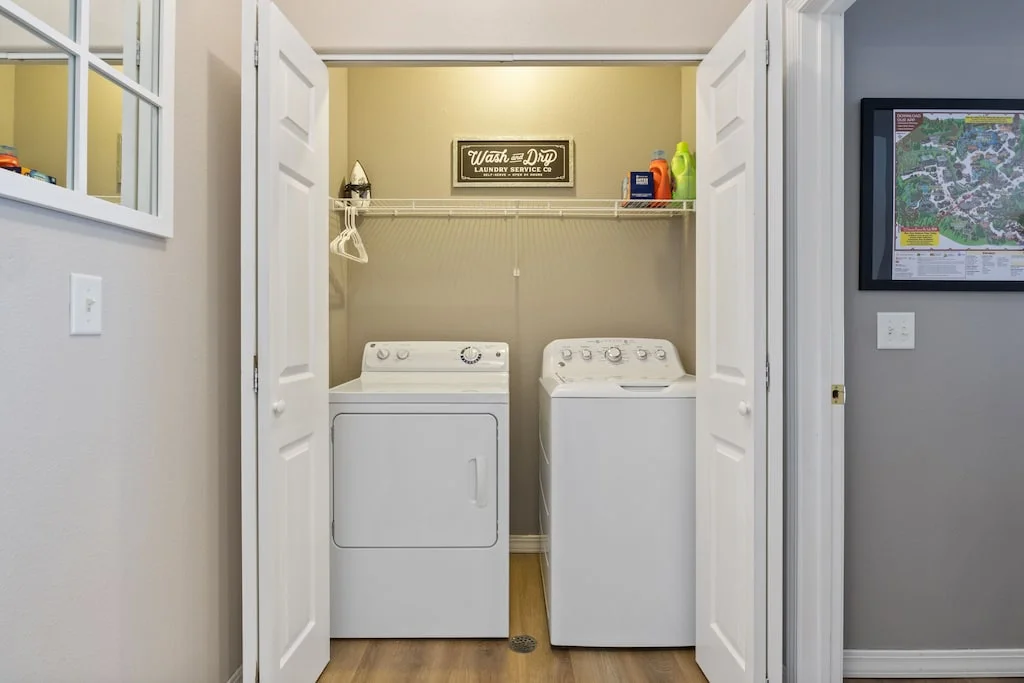 Full size washer and dryer with iron, full size ironing board and hangers
