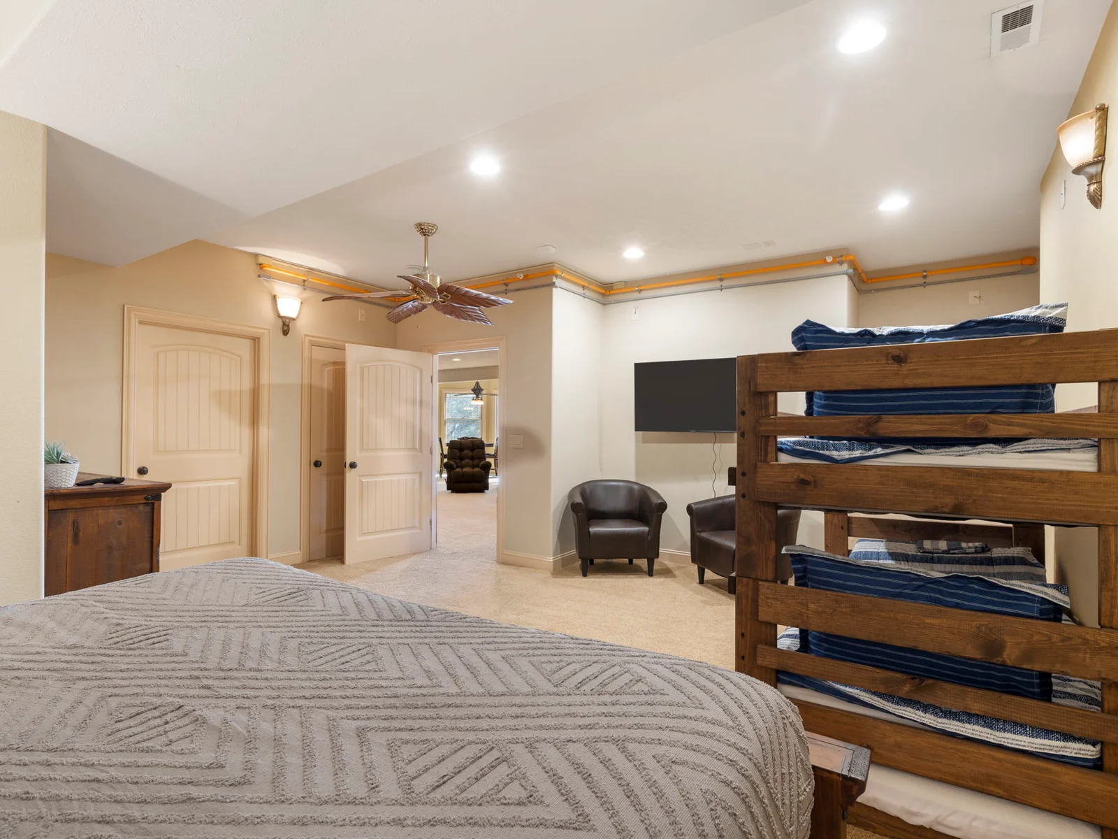 Lower level King with twin/twin bunk bed and trundle-This room sleeps 5