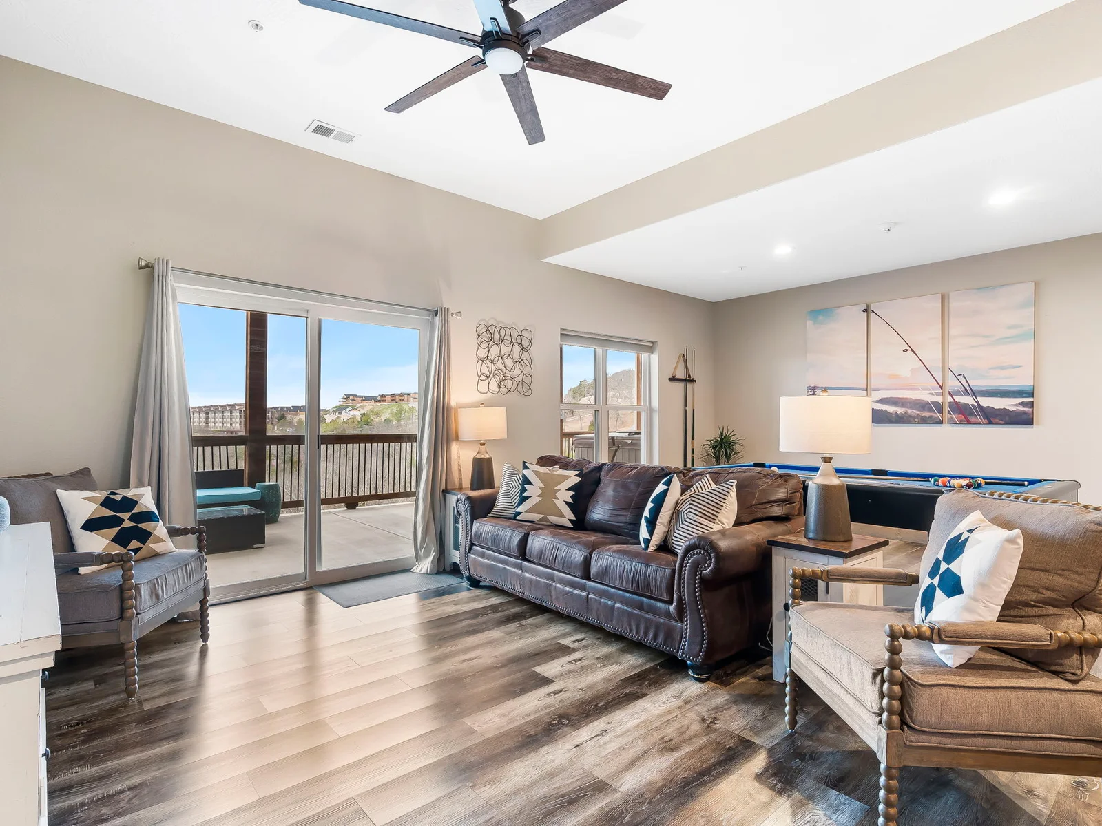 Spacious lower living room with walk-out back deck.