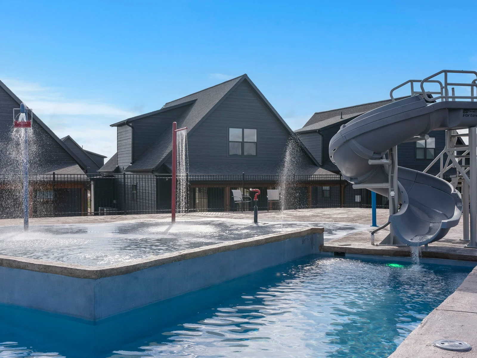 Slide and splash pad at community pool!