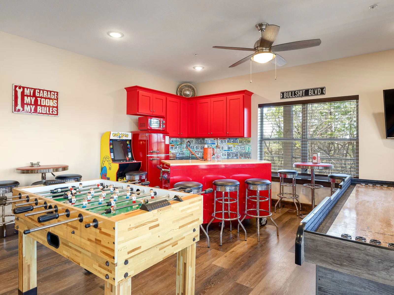 Fooseball, shuffleboard, pac man, claw machine, and pool!!