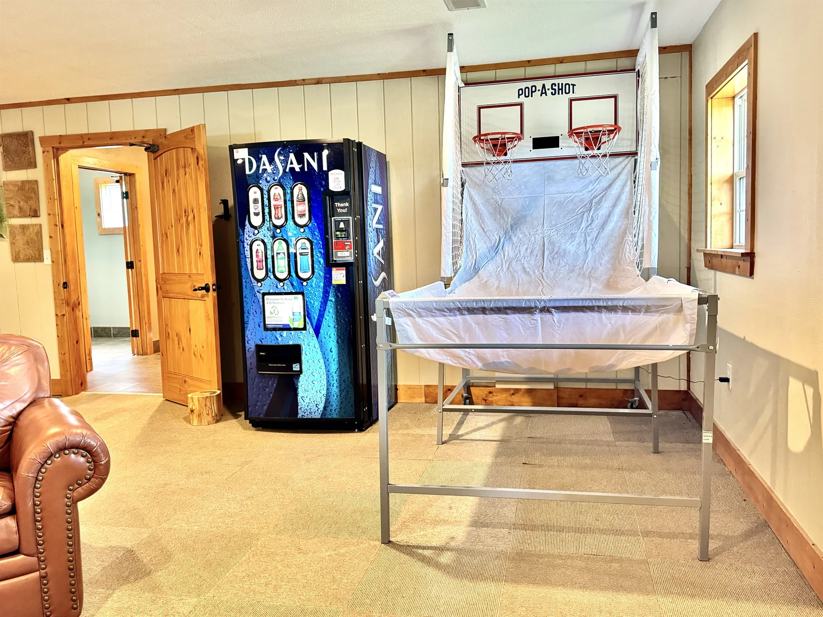Located in the Clubhouse, a vending machine and basketball game!