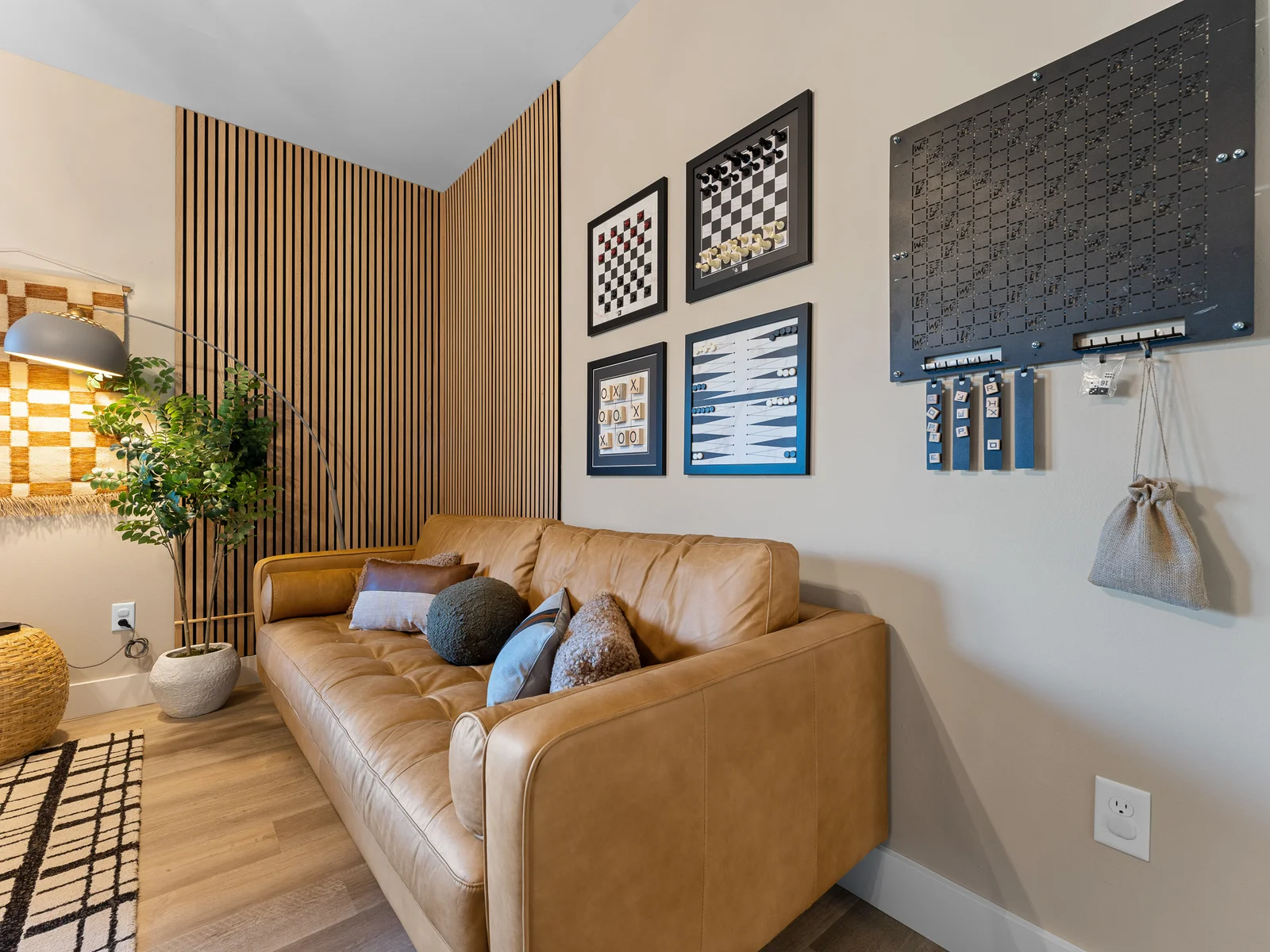 Living Room: Stylish leather seating awaits, perfect for game nights or relaxing with friends!