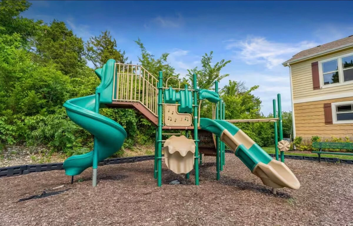 Playground up by pools and clubhouse