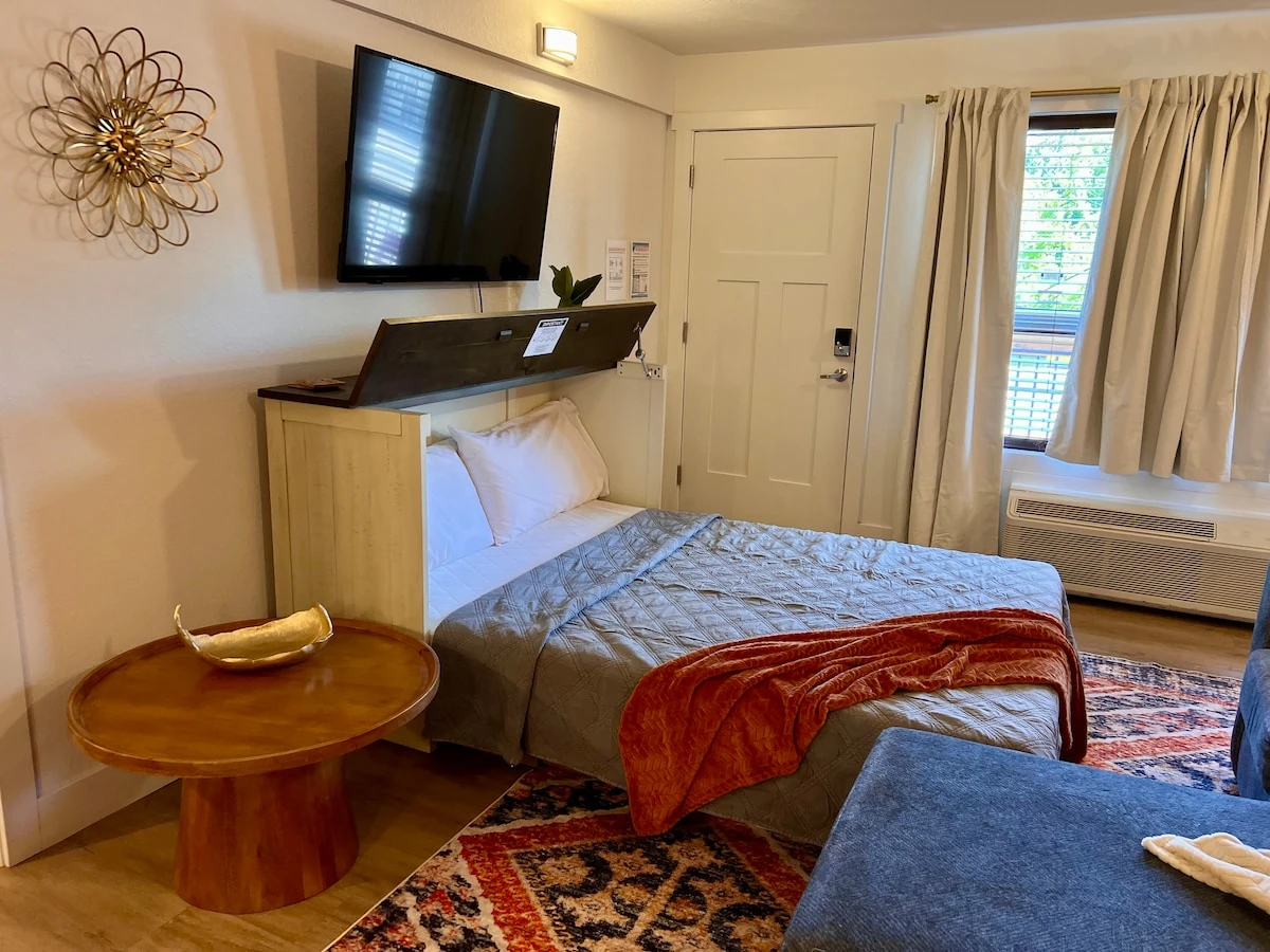 Fold out queen Murphy bed. Linens provided