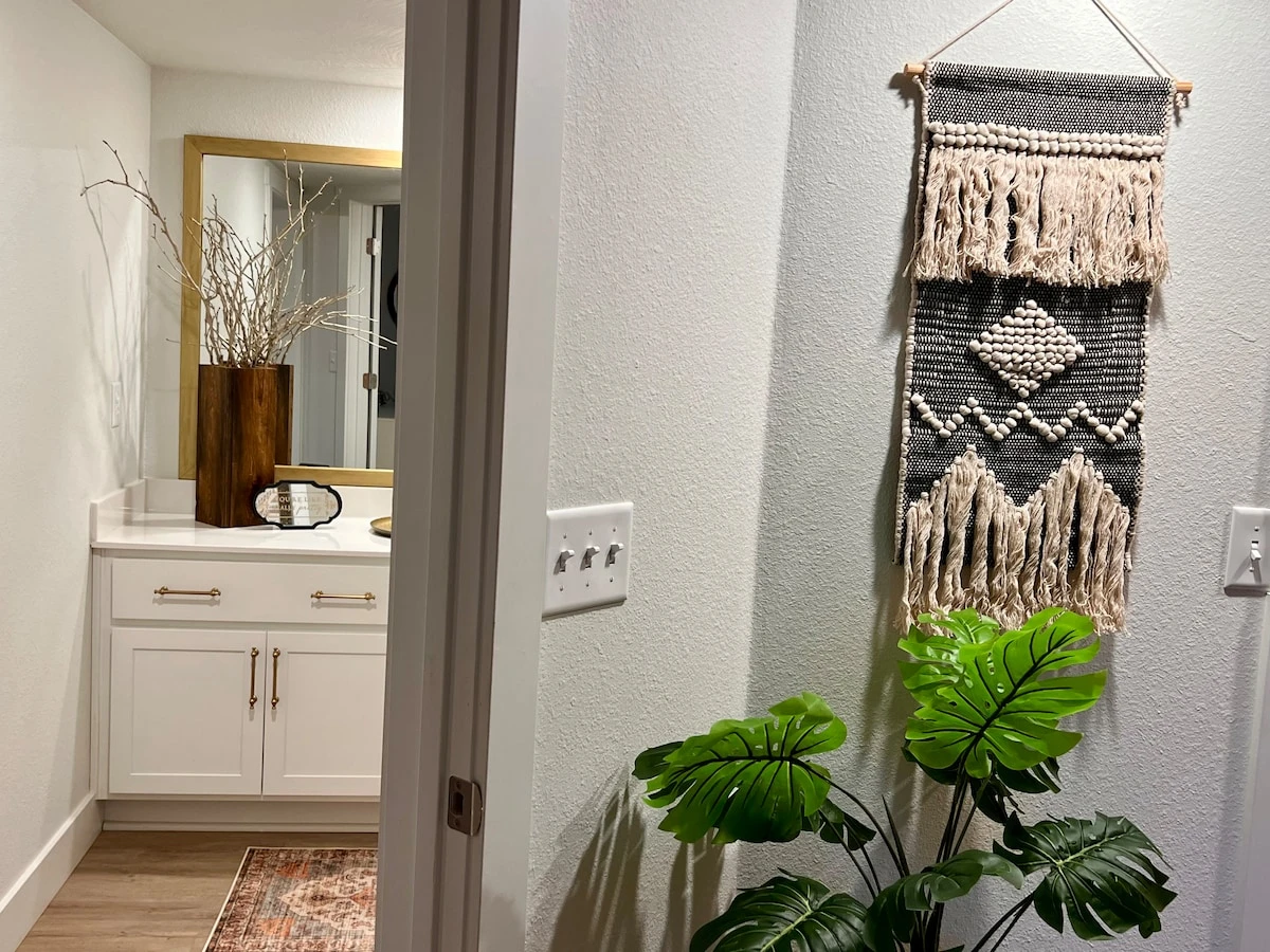 Full bath right outside bedroom door