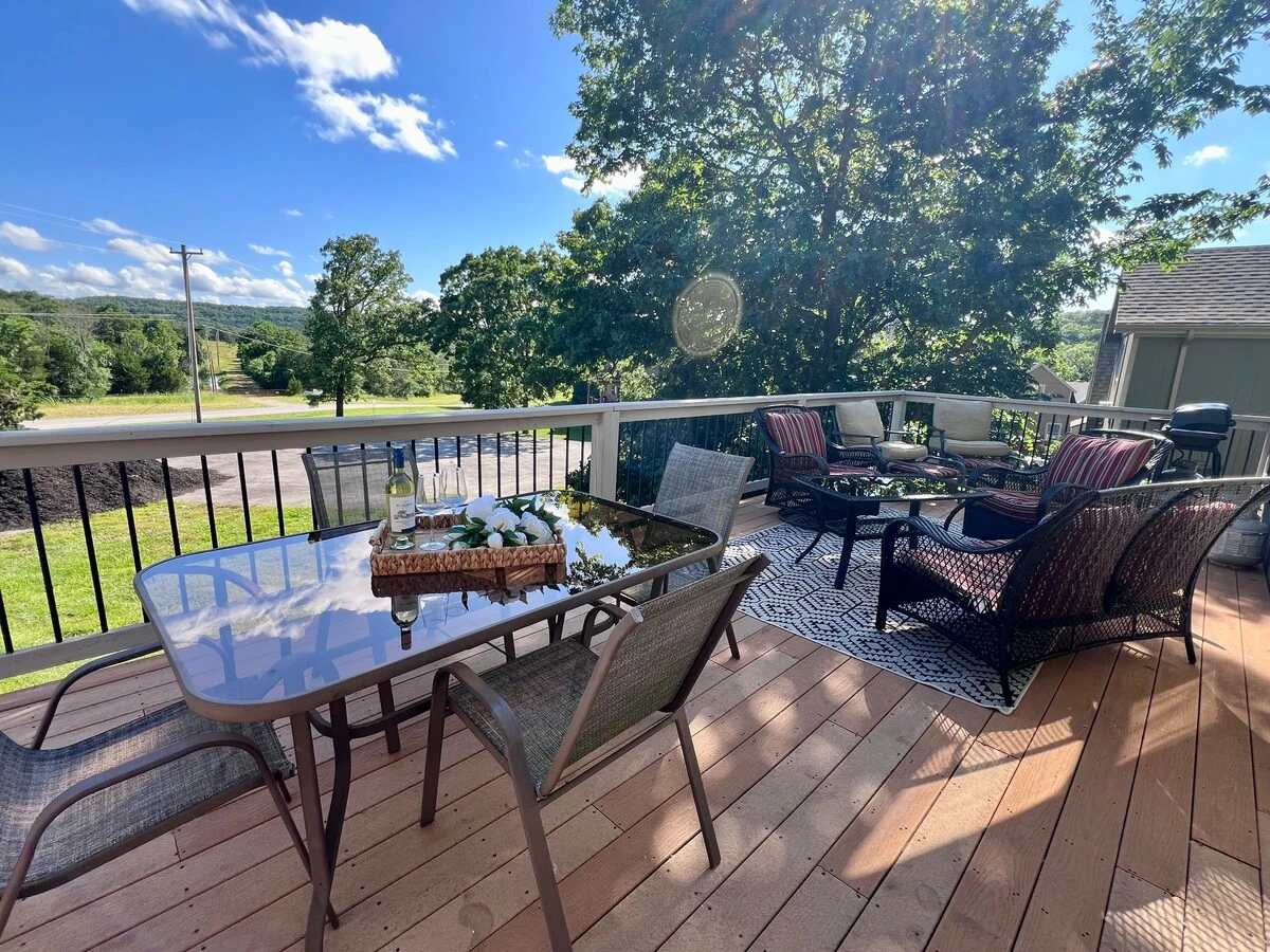 Deck off of 1 main Living Room--gas propane grill--lots of seating